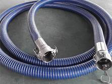 A blue chemical composite hose is on the ground.